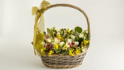 White seasonal flowers basket