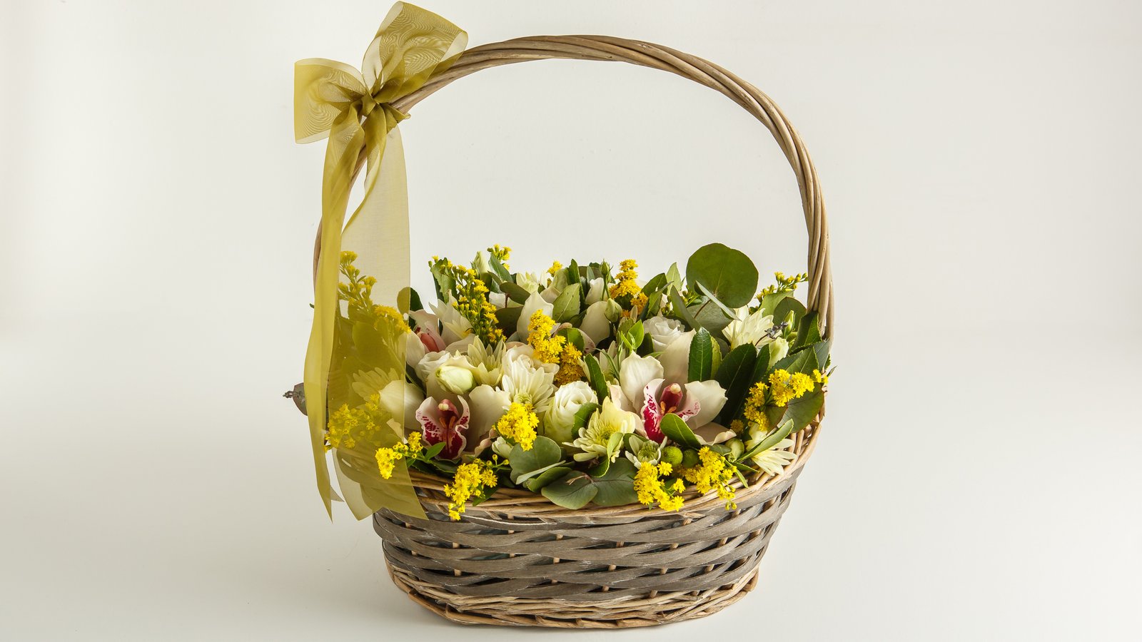 White seasonal flowers basket