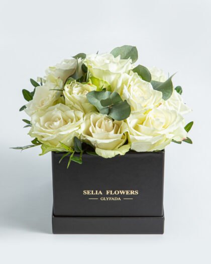 Box with white roses